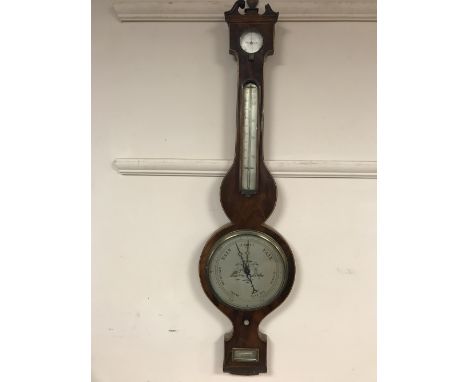 A 19th century inlaid mahogany barometer
