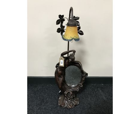 An Art Deco style figured table lamp with mirror in a bronzed finish 