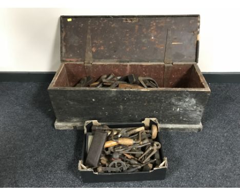 A pine toolbox containing a quantity of vintage hand tools together with another box containing tools 