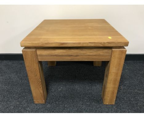 A contemporary oak lamp table 