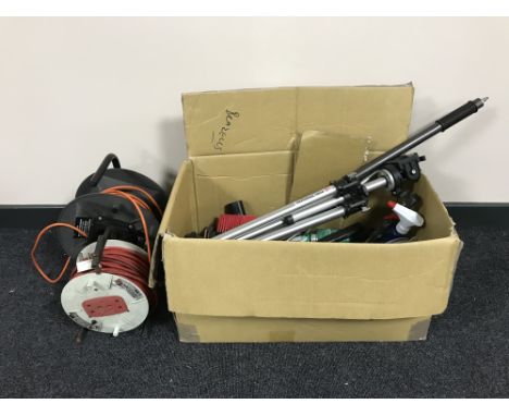 A box of hand tools, fire extinguisher, camera tripod, together with two extension leads