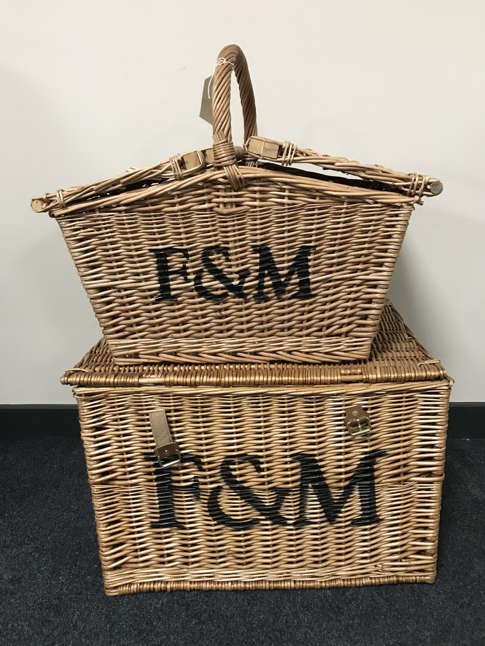 A Fortnum & Mason wicker basket and picnic hamper
