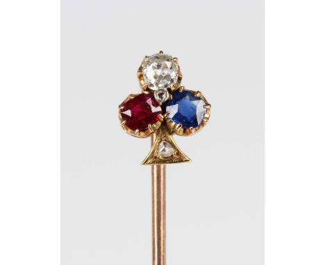 A gold topped, ruby, sapphire and diamond stickpin, the finial designed as the suit of clubs, unmarked, total weight 2.8g, wi