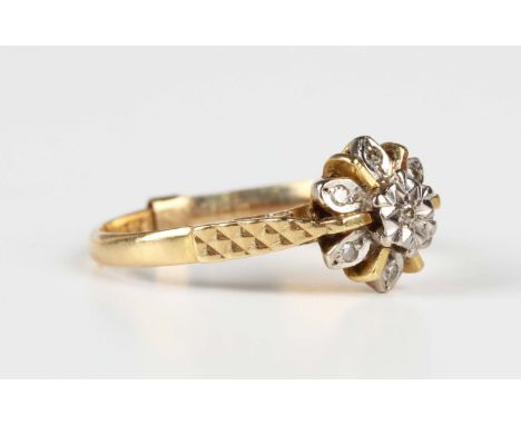 An 18ct gold and diamond seven stone cluster ring, Birmingham 1971, weight 3g, ring size approx L.Buyer’s Premium 29.4% (incl