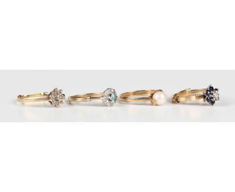 A 9ct gold, blue zircon and diamond cluster ring, London 1975, fitted with a sizing band, ring size approx L, a 9ct gold ring