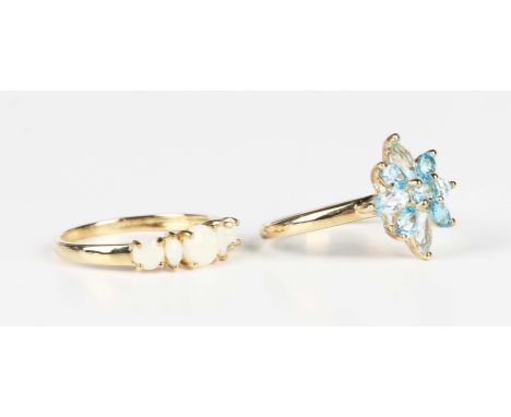 A 9ct gold and opal five stone ring, Birmingham 2006, ring size approx S, and a 9ct gold and varicoloured blue gem set cluste