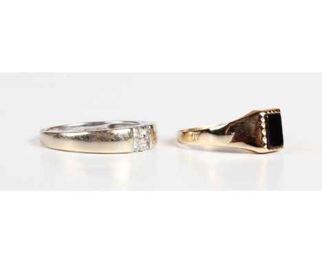 A white gold and diamond ring, mounted with four circular cut diamonds, indistinct mark, weight 3.3g, ring size approx M, and