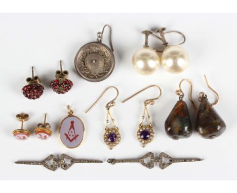 A pair of gold, amethyst and seed pearl pendant earrings with wire fittings, unmarked, weight 2.4g, length 3.3cm (the drops l