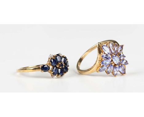 A 9ct gold, sapphire and diamond cluster ring, Birmingham 2006, ring size approx T1/2, and a 9ct gold and tanzanite gem set c
