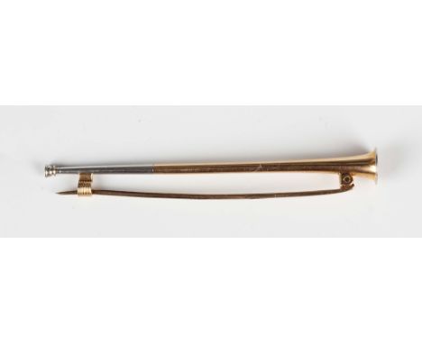 A gold stock pin, designed as a hunting horn, detailed '15ct', weight 5.7g, length 7.6cm.Buyer’s Premium 29.4% (including VAT