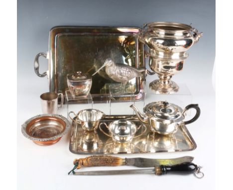 A group of plated items, including a Sheffield plate tea caddy, a model of a snipe, a vase of baluster form with deer's head 