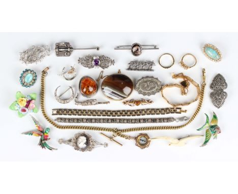 A gold and citrine bar brooch, detailed '9ct', weight 2.6g, width 4.5cm, a gold mounted oval agate brooch, weight 25.1g, nine