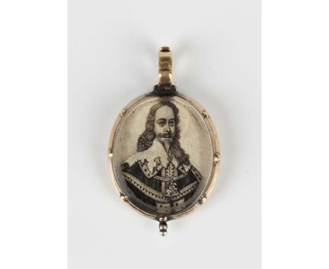 A gold mounted oval memorial pendant locket, 18th century, glazed to one side with a monochrome portrait of Charles I, after 