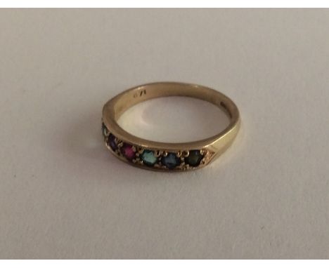 An attractive 9 carat 'Dearest' ring in rubover mount. Approx. 2.5 grams. Est. £50 - £80.