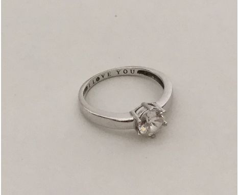 A 9 carat single stone ring entitled, 'I Love You'. Approx. 1.8 grams. Est. £45 - £55.