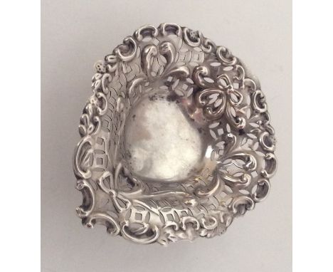A small silver embossed heart shaped bonbon dish. Approx. 26 grams. Est. £20 - £30.