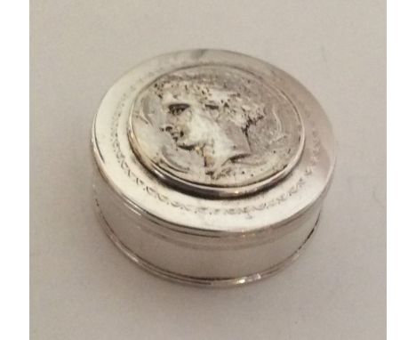 A Continental silver box mounted with Greek figure. Apparently unmarked. Approx. 60 grams. Est. £50 - £80.