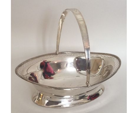 An Edwardian silver bright cut swing handled basket with pierced border. Birmingham. By L&amp;S. Approx. 493 grams. Est. £300