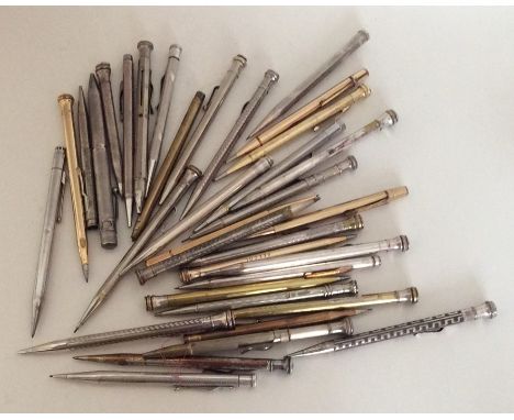 A bag containing numerous silver and gilt extending pencils. Approx. 626 grams. Est. £200 - £300.