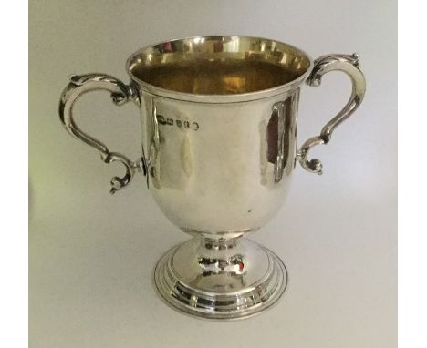 A good George III two handled loving cup of plain form. London 1794. By IK? Approx. 325 grams. Est. £250 - £300.