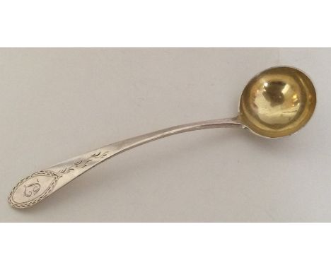An American bright cut silver sauce ladle. By I Clark. Approx. 50 grams. Est. £30 - 340.