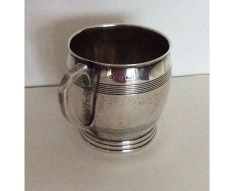 A heavy Edwardian silver christening cup of Art Deco design. Birmingham 1845. Approx. 125 grams. Est. £45 -  £55.