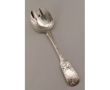 A silver bright cut silver pickle fork. Birmingham 1859. Approx. 25 grams. Est. £20 - £30.