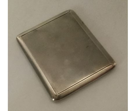 A heavy engine turned silver slide top cigarette case. London. By Aspreys. Approx. 155 grams. Est. £40 - £60.