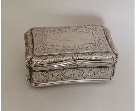 A good quality Victorian silver snuff box engraved with buildings, scrolls and flowers. Birmingham 1857. Approx. 201 grams. E