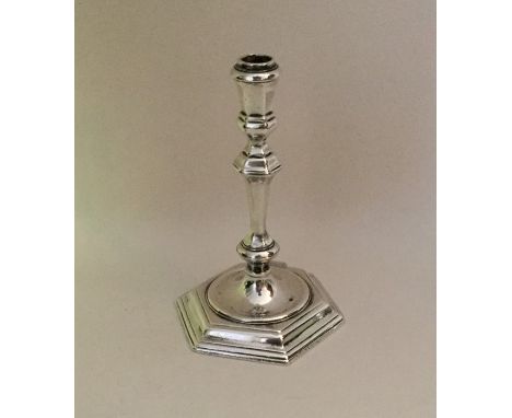 A good George I silver taper candlestick with hexagonal base. London 1727. By DG. Approx. 99 grams. Est. £600 - £800.