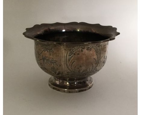 A good quality Chinese silver sugar bowl with bird decoration. Approx. 155 grams. Est. £80 - £120.