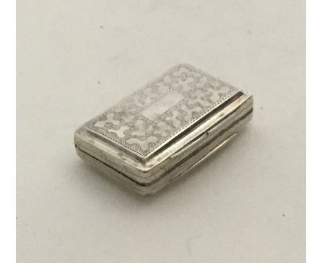 A heavy stylish rectangular silver vinaigrette with leaf decoration to gilt interior. Birmingham. By Thomas Shaw. Approx. 26 