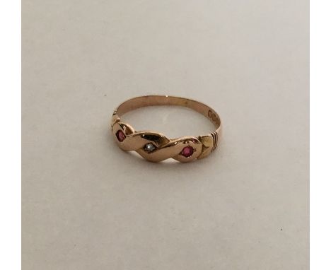 An Antique ruby and diamond gypsy set ring. Approx. 2.4 grams. Est. £70 - £80.