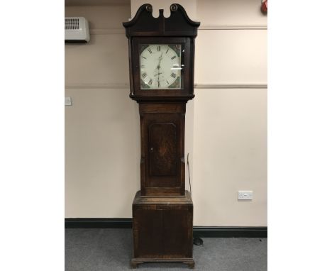 A George III oak 30 hour longcase clock, with painted dial signed R. Morland, height 210cm.