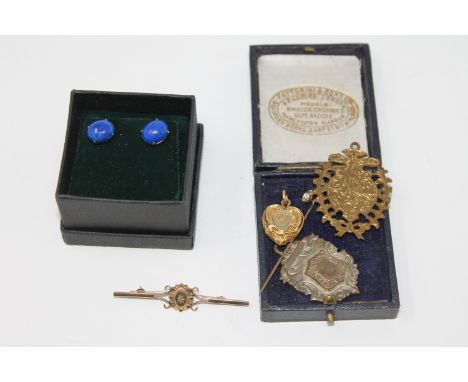 A Victorian gold stick pin, a diamond set gold brooch, two medallions, a memoriam brooch and a pair of earrings set with blue