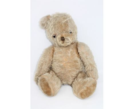 A vintage jointed mohair teddy bear with growler, height 50cm.