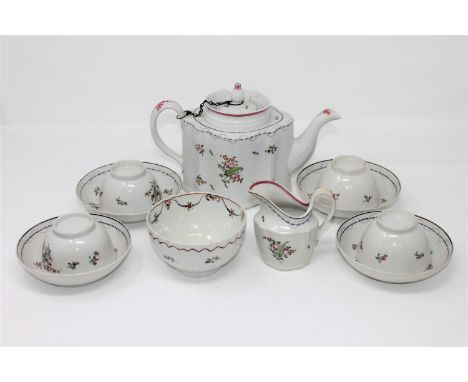 A Newhall porcelain teapot and cover, circa 1790, of commode form, puce mark to underside, height 15cm, together with similar