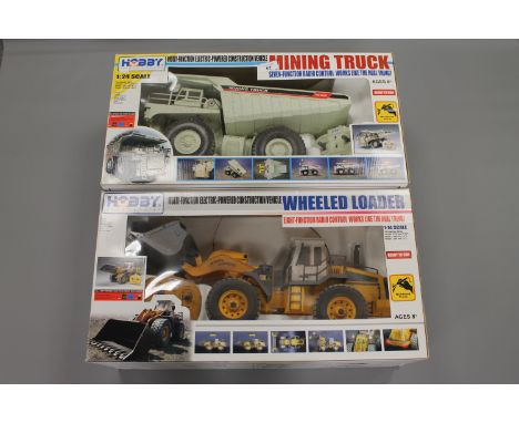 Two Hobby Engine Mining trucks, radio controlled, both boxed. (2)