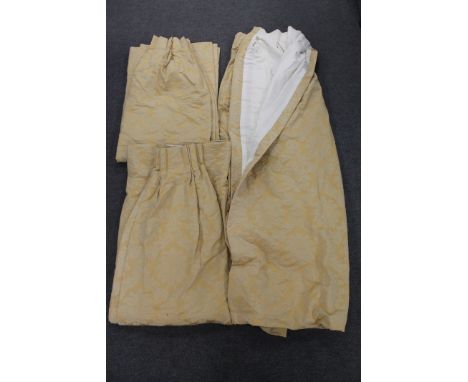 A high quality vintage set of three gold Damask interlined curtains, deep hemmed and double pin tucked, comprising: one curta