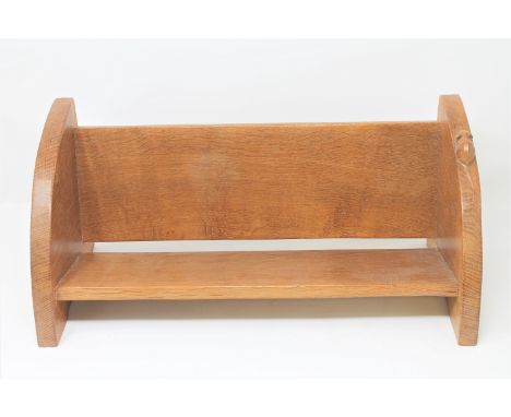 A Robert 'Mouseman' Thompson of Kilburn oak book trough, with carved mouse signature, width 45cm.