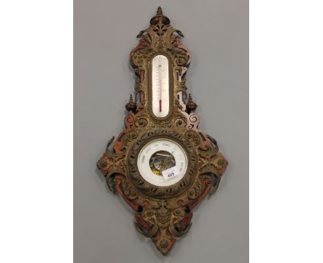 A Victorian holosteric barometer ornately mounted in embossed brass. 