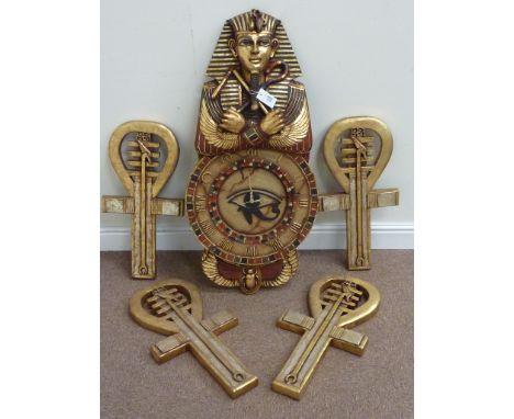 Egyptian design wall clock surmounted by a pharaoh H100cm, and three wall mounted gold ankhs (5)