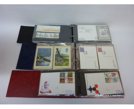 Album of GB commemorative First Day Covers with matching mint stamps and two other albums of FDCs (3)