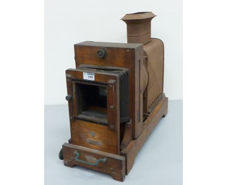 Victorian oak framed magic lantern projector bearing plaque 'The Weydale Enlarger', Patent 14137/1819  L60cm 