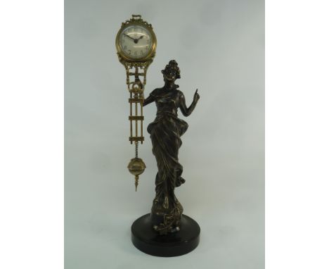 Junghans style spelter figure mystery clock, H34cm