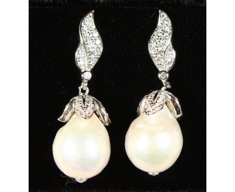 A PAIR OF SILVER AND BAROQUE PEARL DROP EARRINGS, boxed.