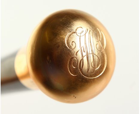 AN EARLY 20TH CENTURY WALKING STICK, with 9ct gold top engraved with initials and dated Dec. 2nd 1915. 91cms long.