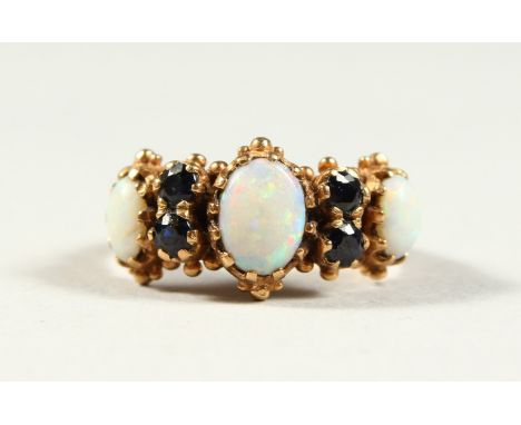 A 9CT GOLD, OPAL AND AMETHYST FIVE STONE RING.