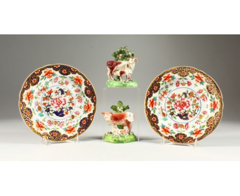 A PAIR OF SPODE JAPAN PATTERN PLATES, Pattern No. 2630, 21cms diameter, and a PAIR OF COW AND CALF GROUPS, 10cms high (4).