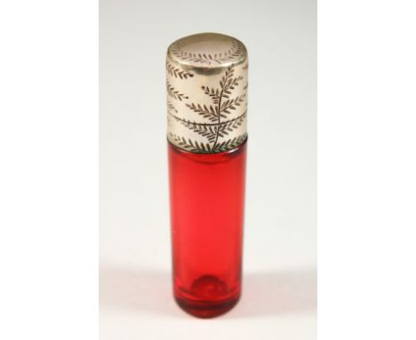 A VICTORIAN PLAIN RUBY GLASS SCENT BOTTLE AND STOPPER with engraved silver cap. 7cms long x 1.5cms diameter.